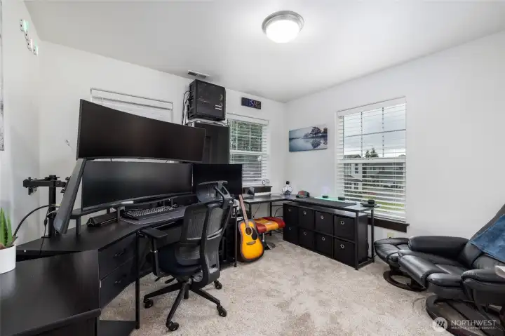 Upstairs bedroom, used as office. Security camera in use in this room.