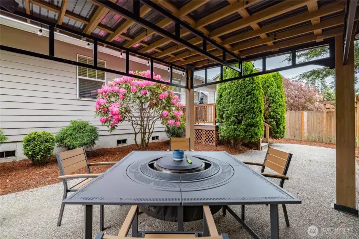 Mature landscaping adds privacy.