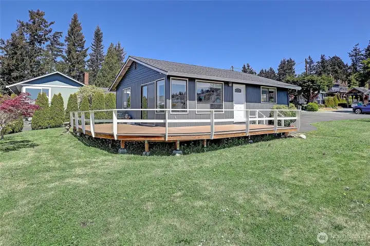 Large expansive deck overlooking the water and mountains views