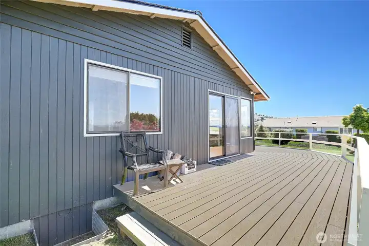 Entertain your guests on the large deck with water, mountain and sunset views