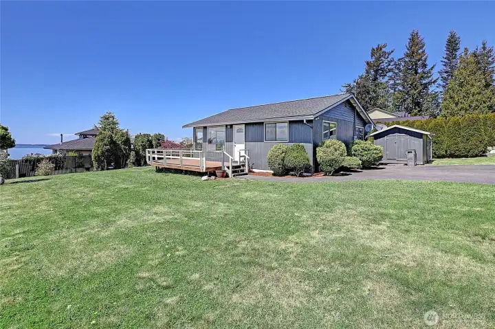 Large level corner lot is perfect for a volleyball net, horseshoe pits or a corn hole tournament.