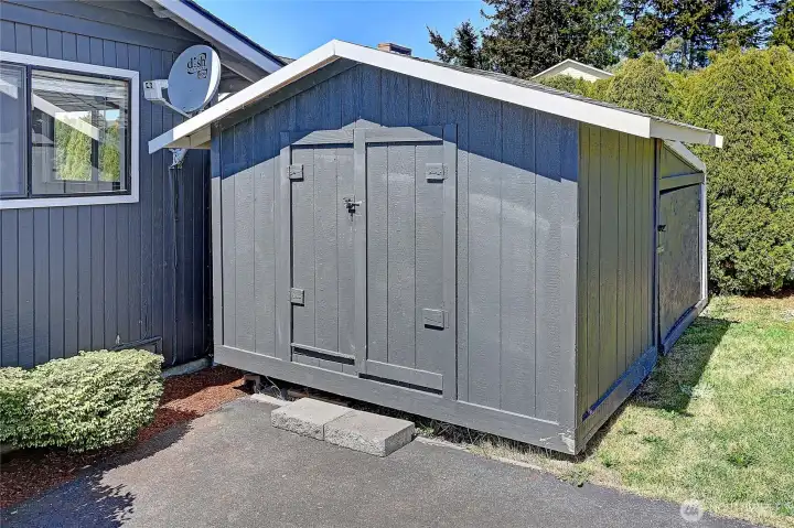 Storage shed located off the driveway.
