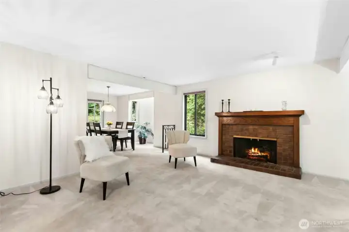 The living room has 1 of 2 main level fireplaces. The living room has 1 of 2 main level fireplaces.