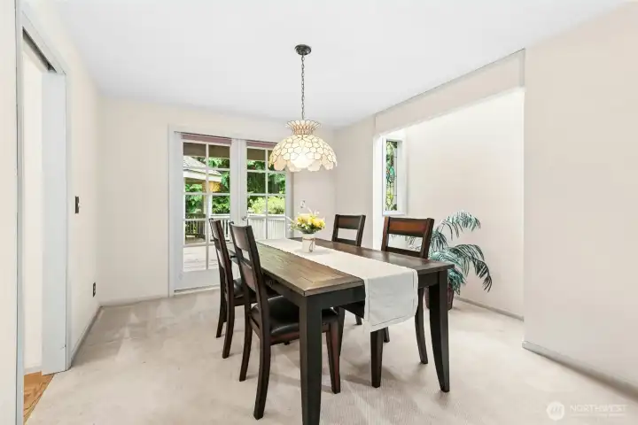 Formal dining room is adjacent to the kitchen. Formal dining room is adjacent to the kitchen.