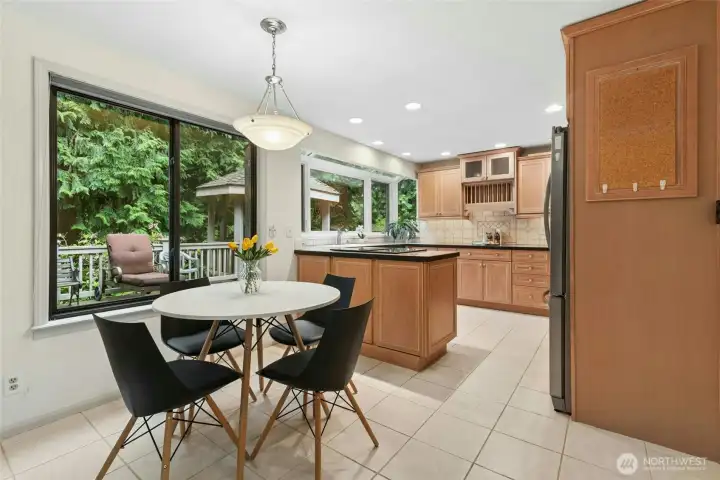 Breakfast nook area is next to the kitchen. Breakfast nook area is next to the kitchen.