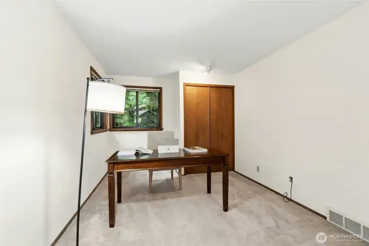 Upper level den-office or rec room. Upper level den-office or rec room.
