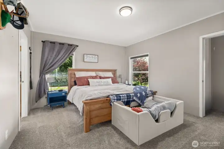 Primary Bedroom with two closets (one walk in with built ins)
