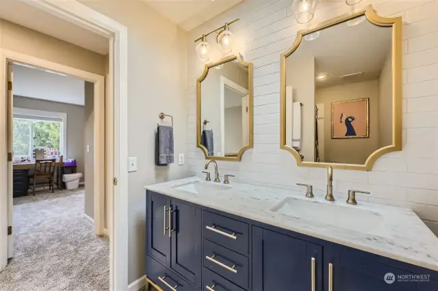 Renovated Guest Bath with dual sinks.