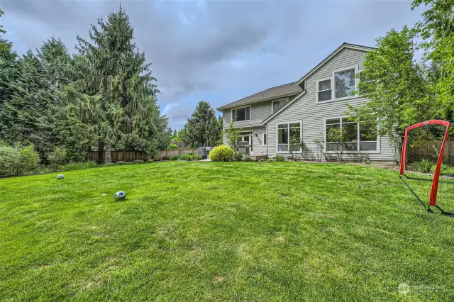 The large, level lawn in back is perfect for summer games and fun.