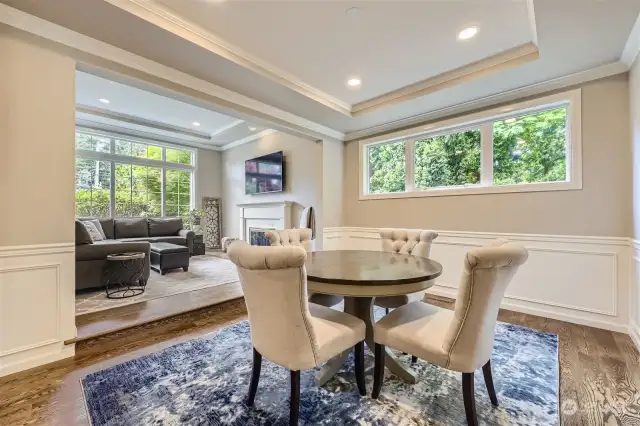 You'll find a continuance of the panned ceilings and hardwood floors in the spacious, formal dining room with wainscotting.