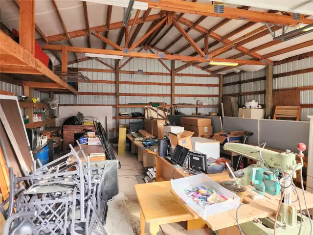 Garage is good sized, plenty of room for work and storage.