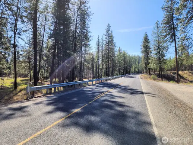 View of HWY 25 looking south at the entrance of the property.