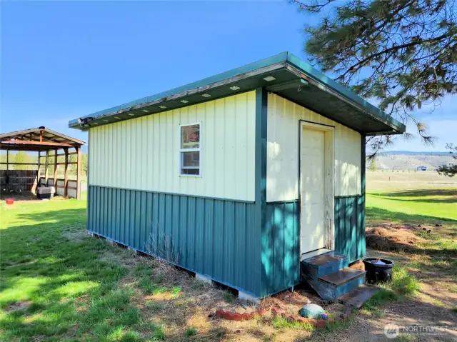 Seperate shed next to the home that could be used as storage, animal shelter or sleeping space. It does have power.