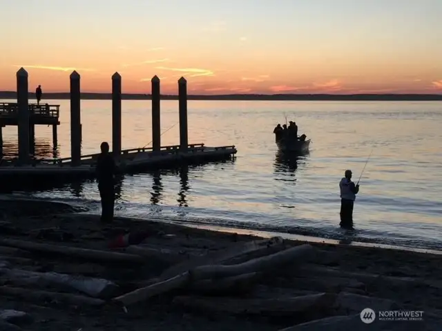 Fishing at sunset just steps from your home.