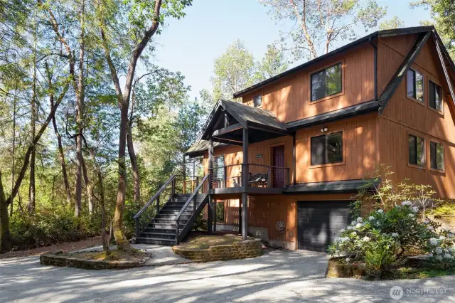 Front of the home with parking available on the driveway for four vehicles.