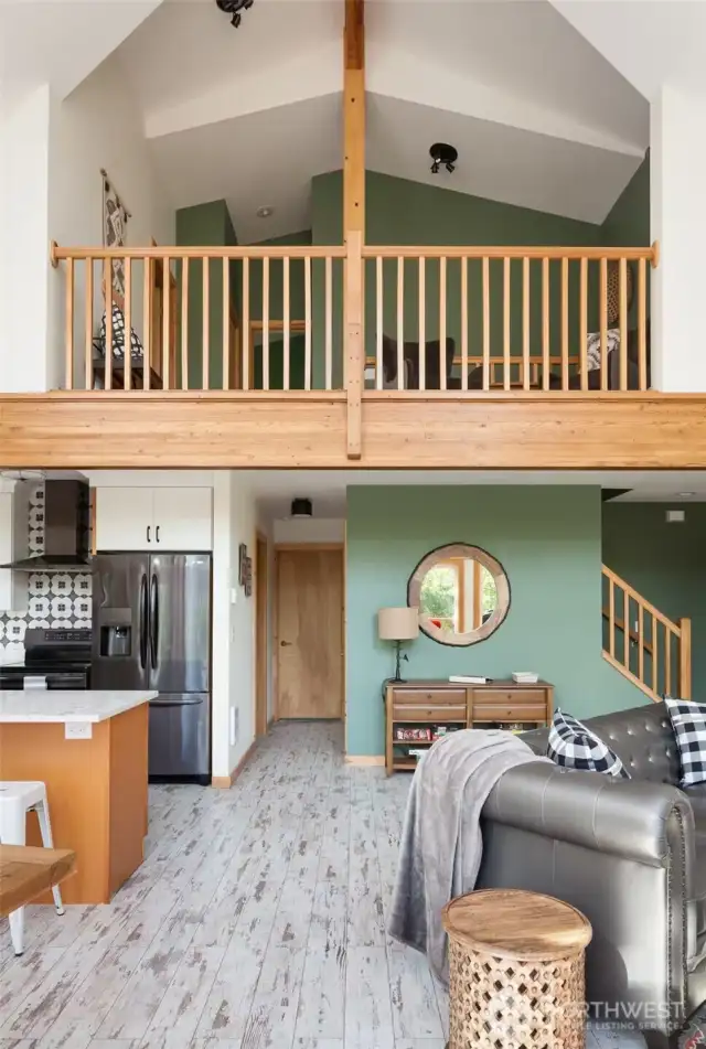 View from living room up to the loft area.