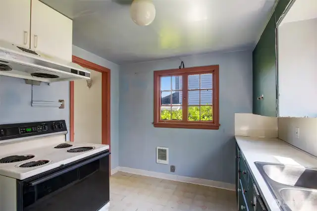 Though in need of some TLC, this sweet bungalow is totally livable and still has many of it's charming original features - hardwoods, tile wood fireplace, original windows, sconces and cedar lined closets. This home was recently rented.