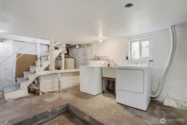 Basement utility area. Appliances stay.