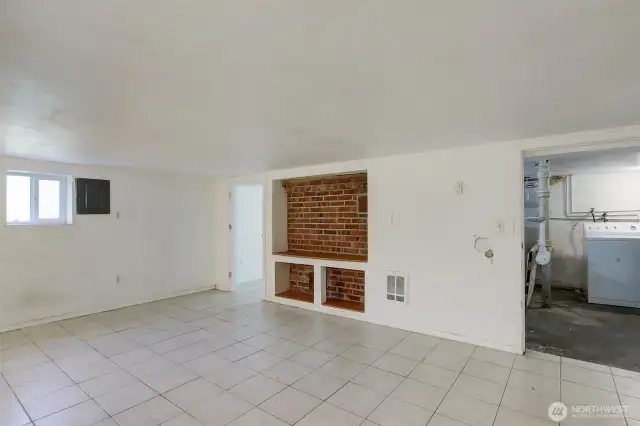Large flex room in basement is fully finished. Could be fixed up to be a home office, man cave, storage area, play room. Low ceilings.