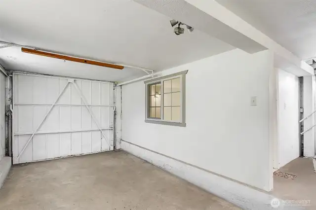 Garage will accommodate a small car. Would also be ideal as a workshop or storage area.