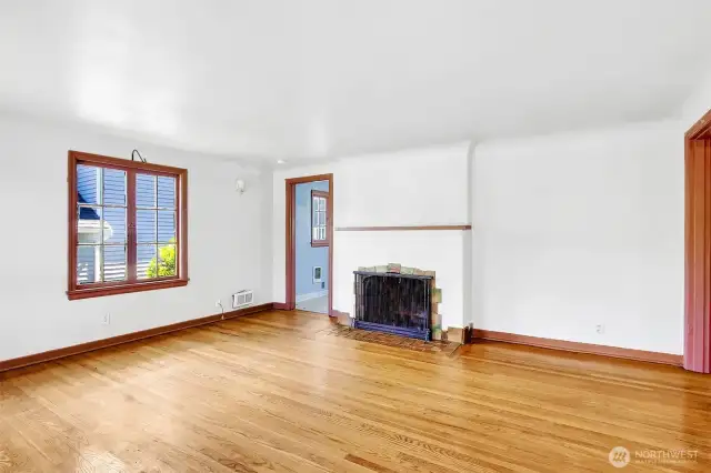 Though in need of some TLC, this sweet bungalow is totally livable and still has many of it's charming original features - hardwoods, tile wood fireplace, original windows, sconces and cedar lined closets. This home was recently rented.