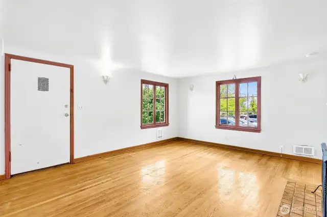 Though in need of some TLC, this sweet bungalow is totally livable and still has many of it's charming original features - hardwoods, tile wood fireplace, original windows, sconces and cedar lined closets. This home was recently rented.