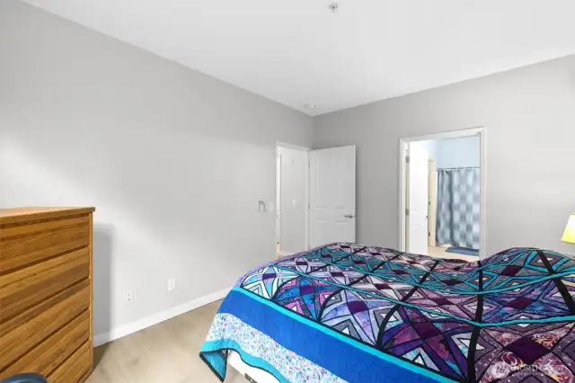 The primary bedroom offers respite at the end of the day.