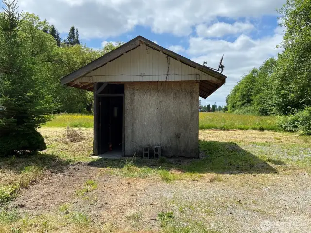 Shed on the property on concrete slab.