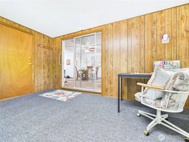 The "sunroom" addition has a sliding door into the rest of the house.