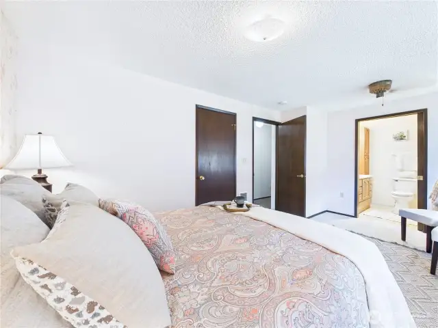 The primary bedroom has a convenient 3/4 en suite.