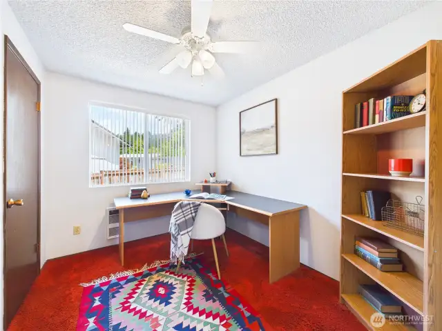 The second bedroom, here used as an office is good sized.