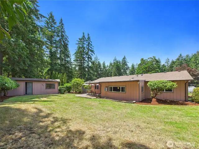 The large, fully fenced back yard allows for garden space, planting fruit trees or to have a big toy. Whatever you can dream up; this back yard can accommodate.