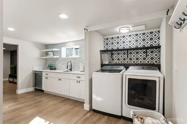 Lower level wet bar includes beverage fridge. Oh - and the washer & dryer stay!