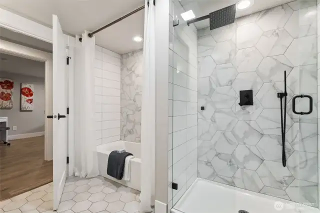 Lower level bathroom includes separate tub and step-in shower!