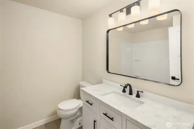Downstairs hall bathroom has been updated.