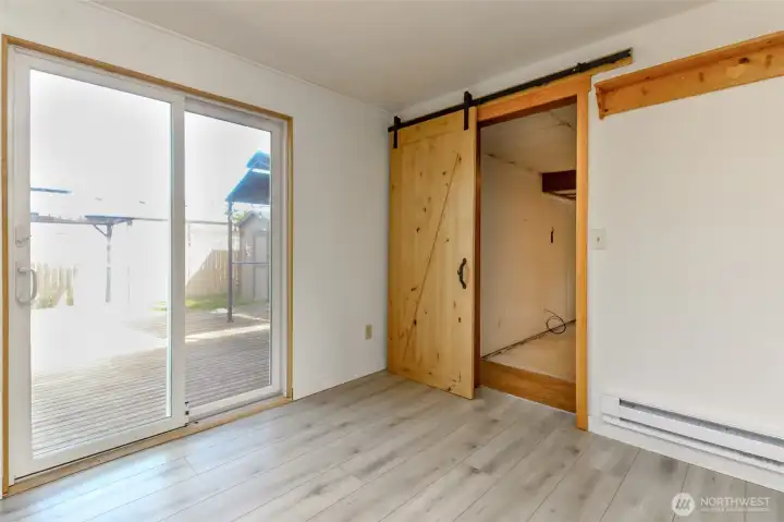 Modern farm door leading to the great room.