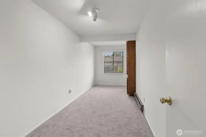 Lower level bonus room. This has been used as an office.