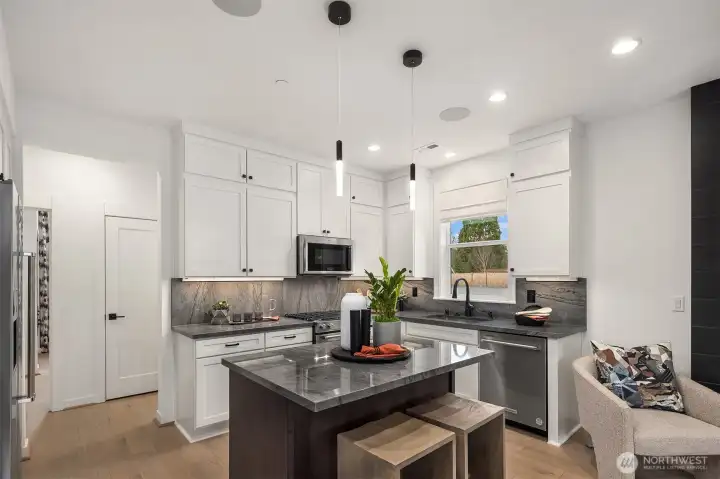 Photos are of a previous model of similar floorplan. Details, surfaces and features may differ. For demonstration purposes only.