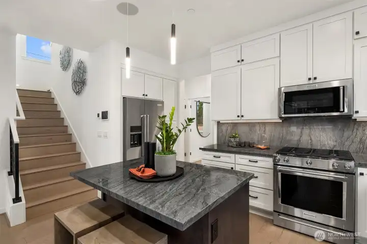 Photos are of a previous model of similar floorplan. Details, surfaces and features may differ. For demonstration purposes only.