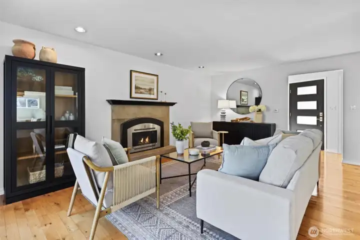 Front family room with gas burning fireplace and views!