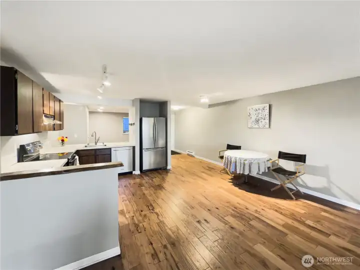 Wide open kitchen. Plenty of room to put a dining table and chairs.