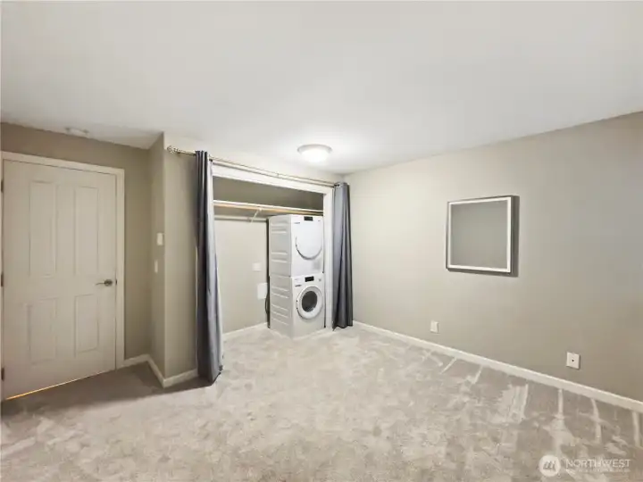 2nd bedroom with new washer and dryer