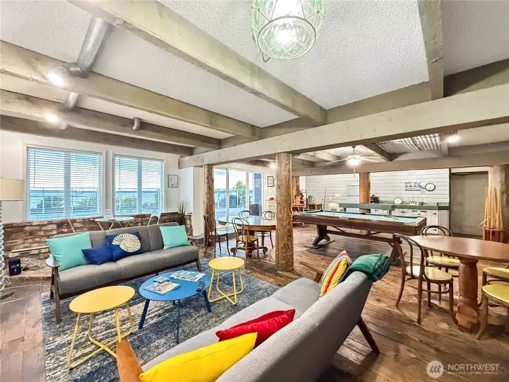 Another view of the community space. The door leads to the outdoor pool and more great views of the bay and Boulivard Park.