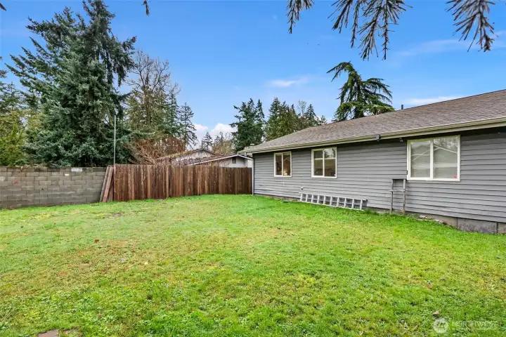 Fully fenced backyard.