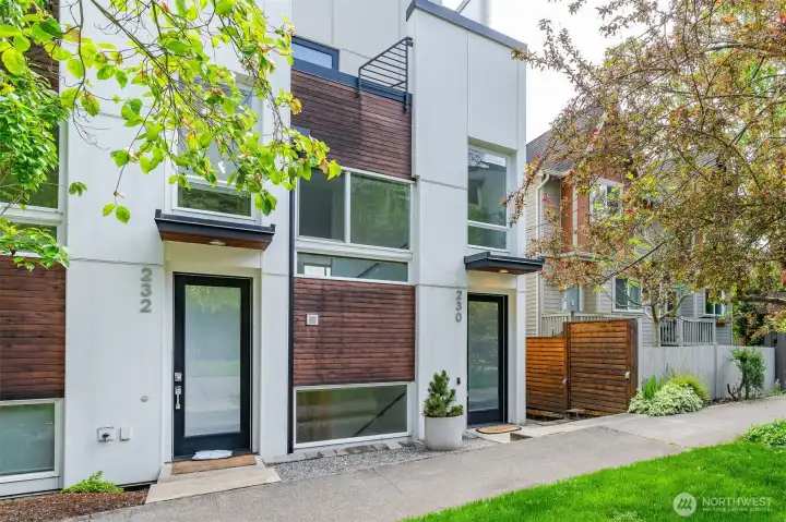 Move-in ready 2 bed home with rooftop deck in sought after Madison Park.