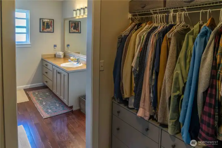 1 of 2 walk in closets attached to primary