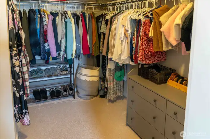 1 of 2 walk in closets attached to primary