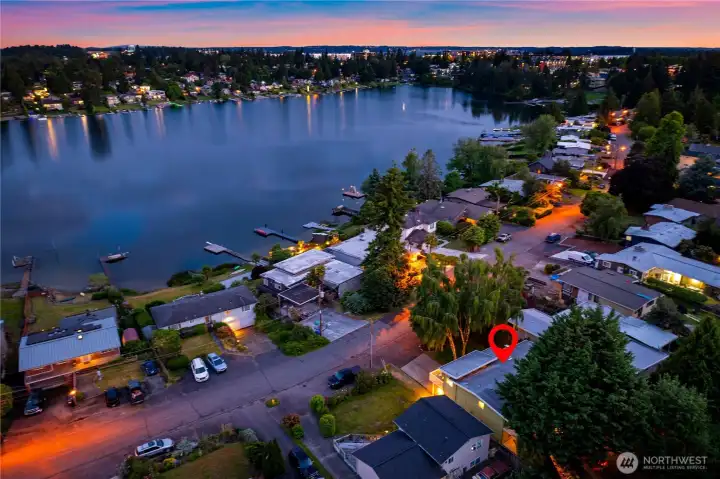 Directly across the street from the lake. Private beach access 1/10th of a mile away.