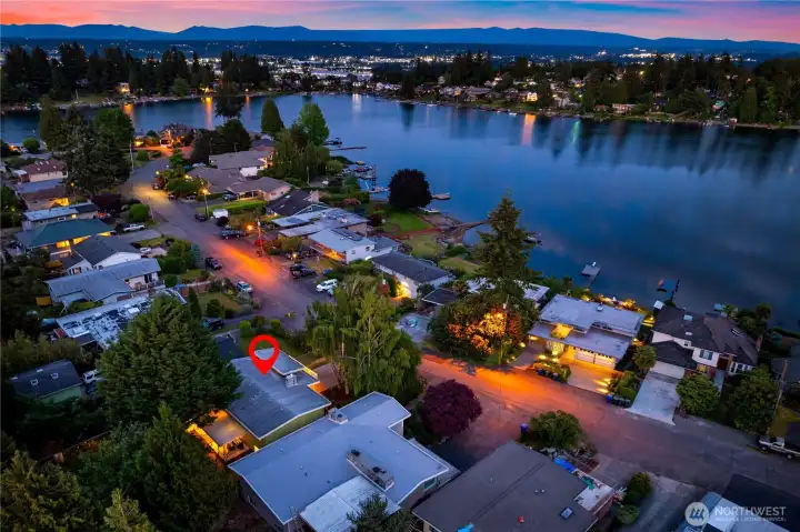 Directly across the street from the lake. Private beach access 1/10th of a mile away.