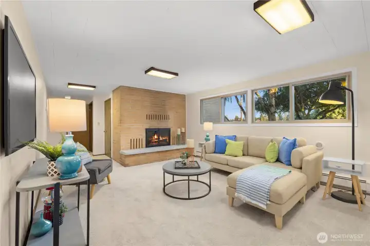 Lower rec room is an amazing space with another wood burning fireplace. New paint and carpet.
